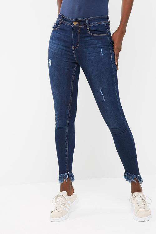 Slanted frayed hem mid rise skinny