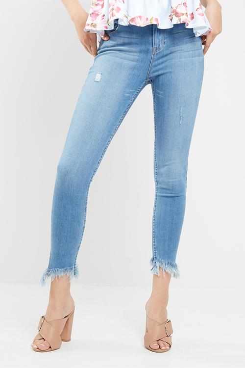 Slanted frayed hem mid rise skinny