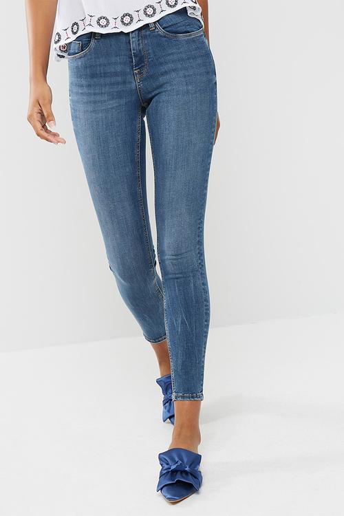 Mid rise shape embracer skinny jeans