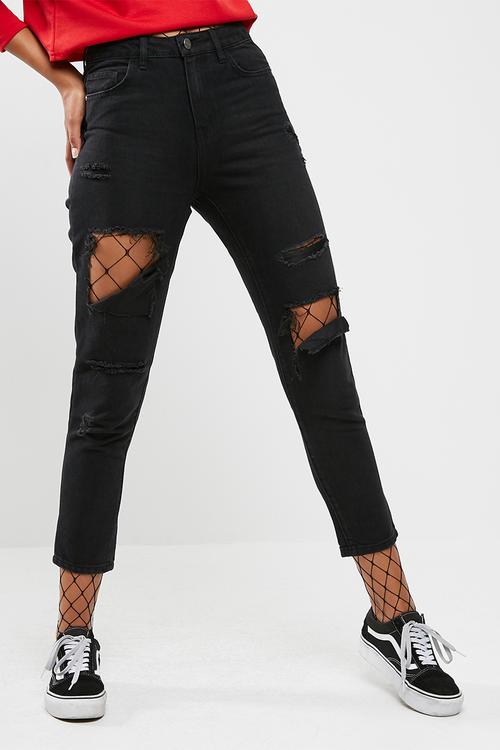 Taylor destroy fishnet jeans