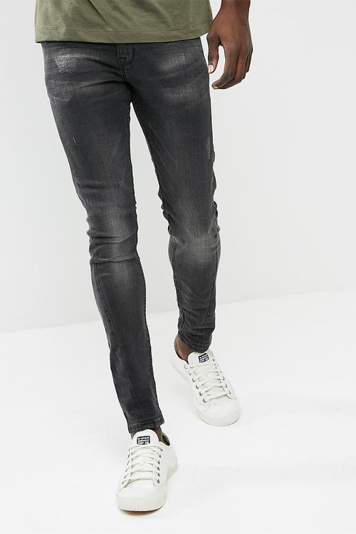 Washed twisted seam skinny jeans