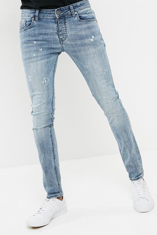 Paint splattered feather slim fit jeans