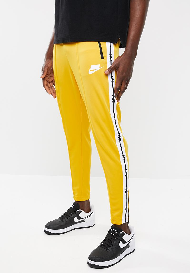 Nike M Nsw Nsp Track Pant Yellow Ochre white Prices Shop Deals Online PriceCheck