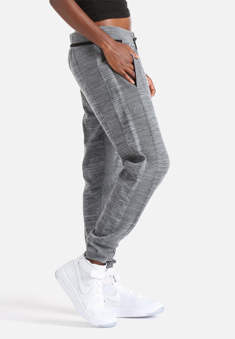 grey nike tech pants