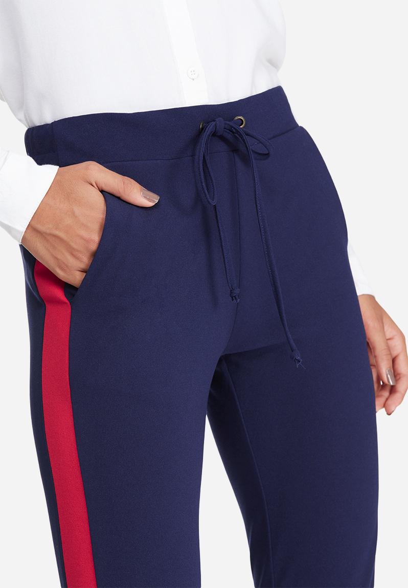 navy trousers with red stripe