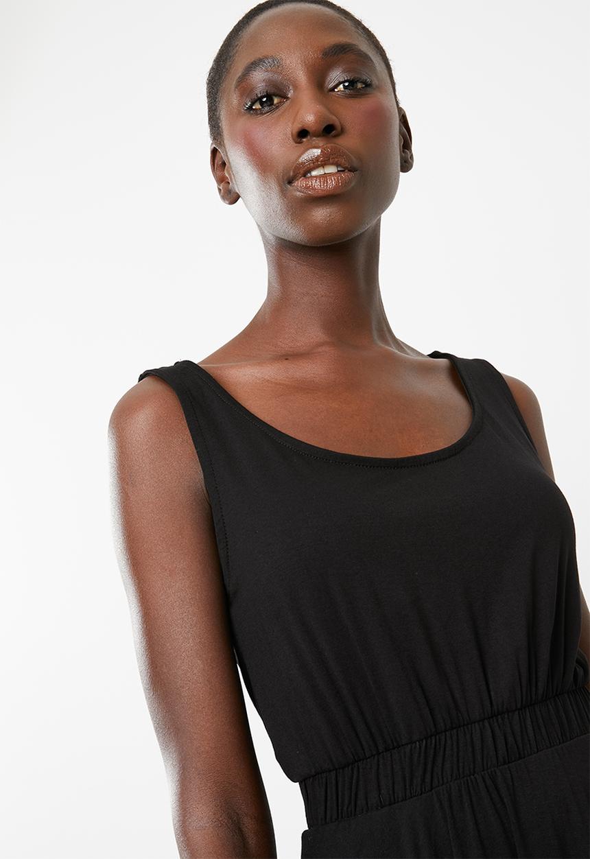 edit - Sleeveless dress with dipped hem - black