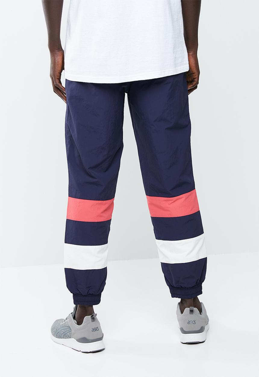Asics Tiger - CB windbreaker pants - navy