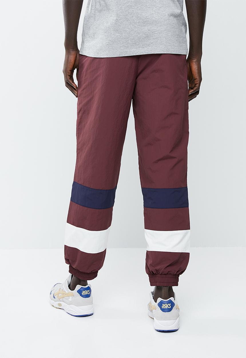 Asics Tiger - CB windbreaker pants - burgundy