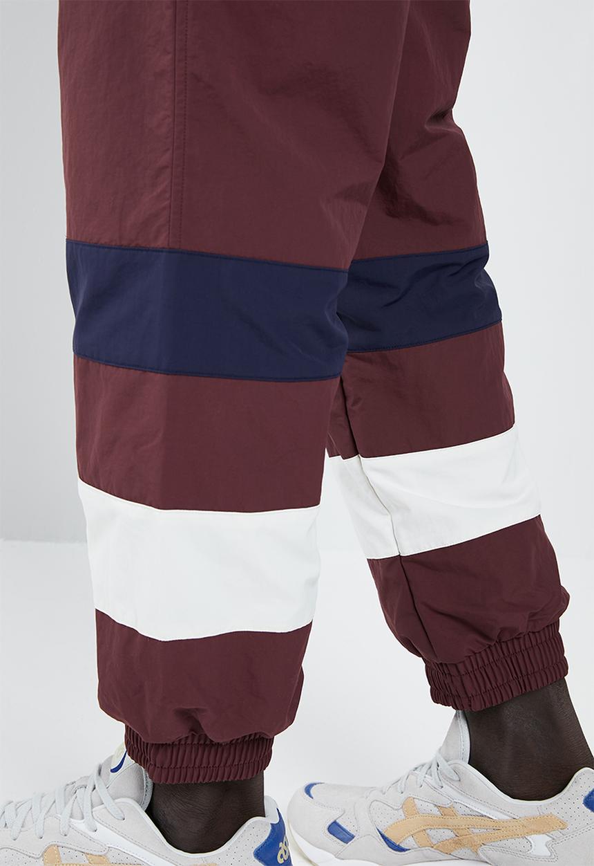 Asics Tiger - CB windbreaker pants - burgundy