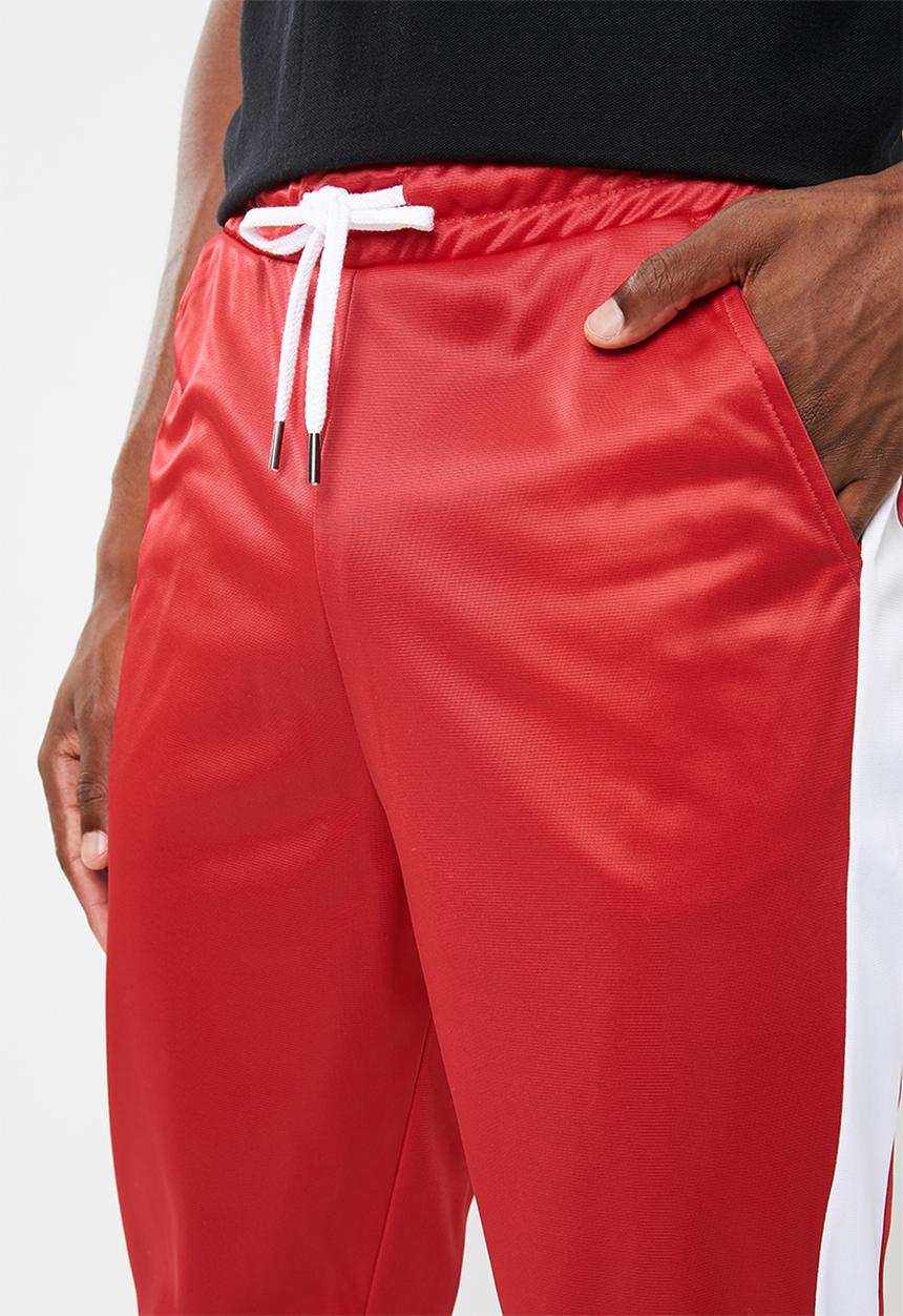 Superbalist - Slim side stripe tricot pant - red and white