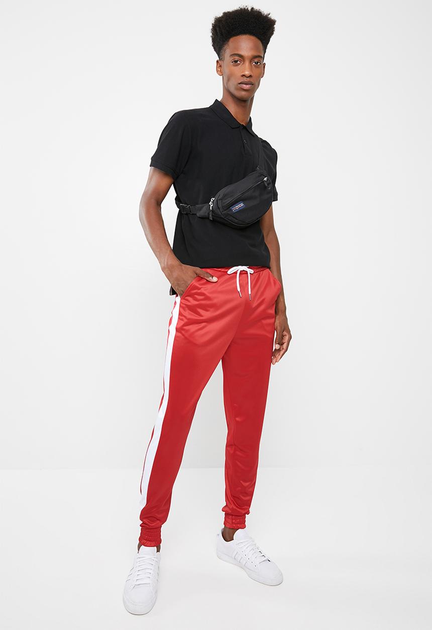 Superbalist - Slim side stripe tricot pant - red and white