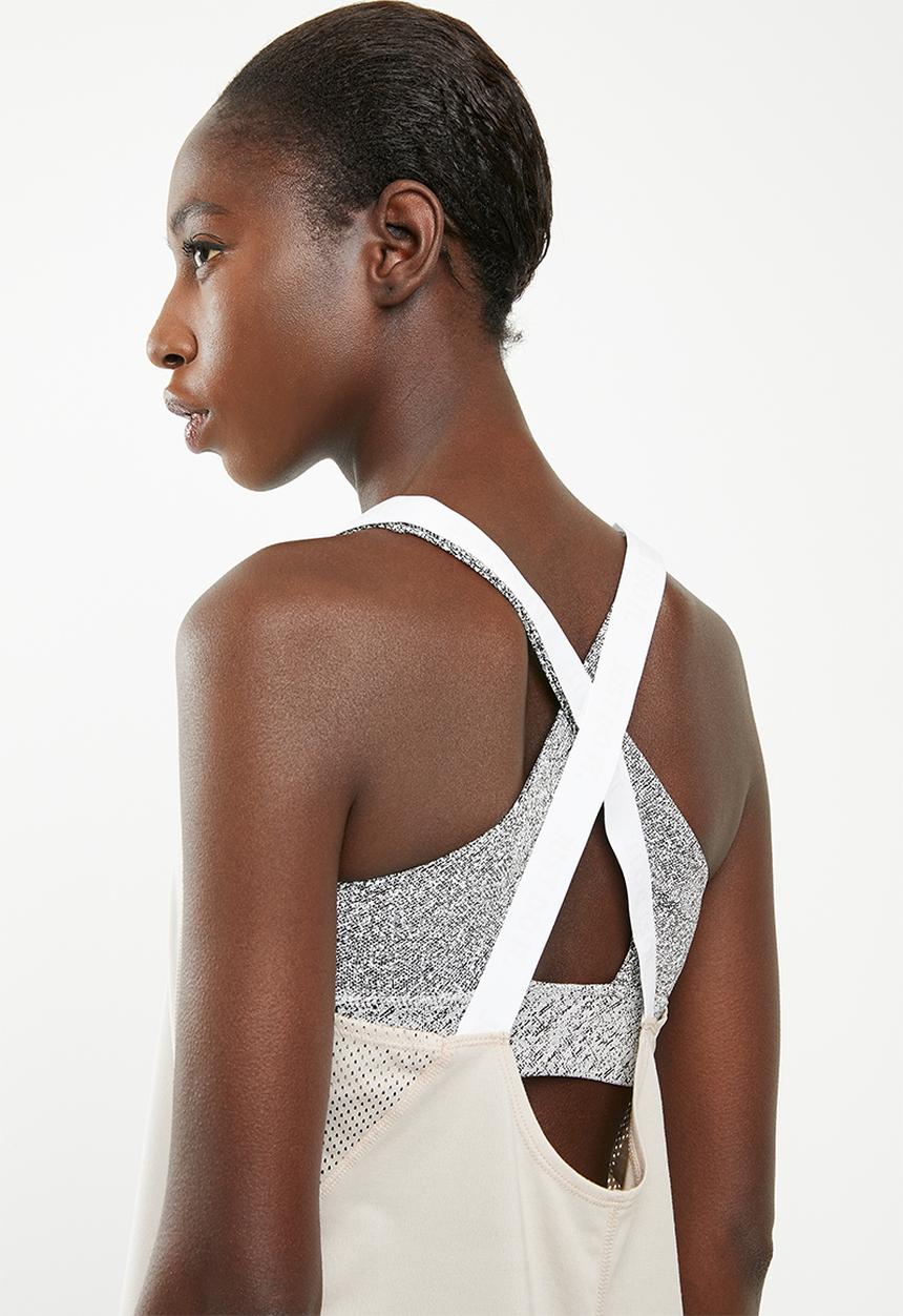 Nike - Dry tank elastica - beige
