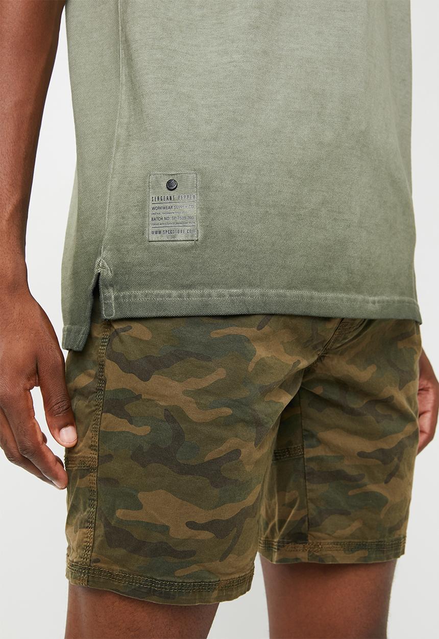 S.P.C.C - Dirty dye pique golfer with binding - green & black 