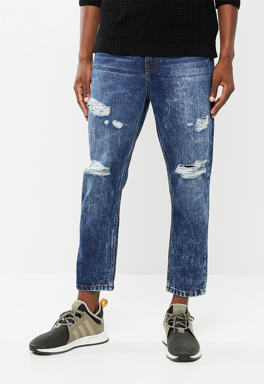 Superbalist - Regular tapered cropped ripped jeans - blue