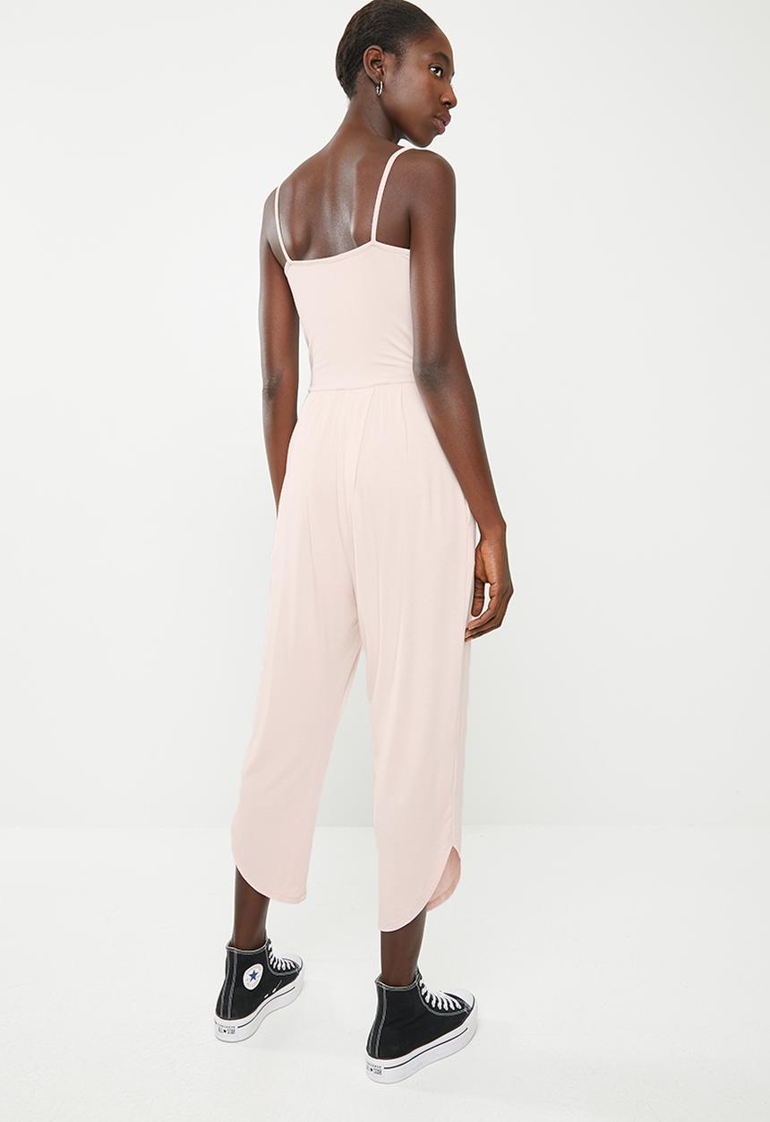 Superbalist - Strappy yoga jumpsuit with pockets at the hip - pink