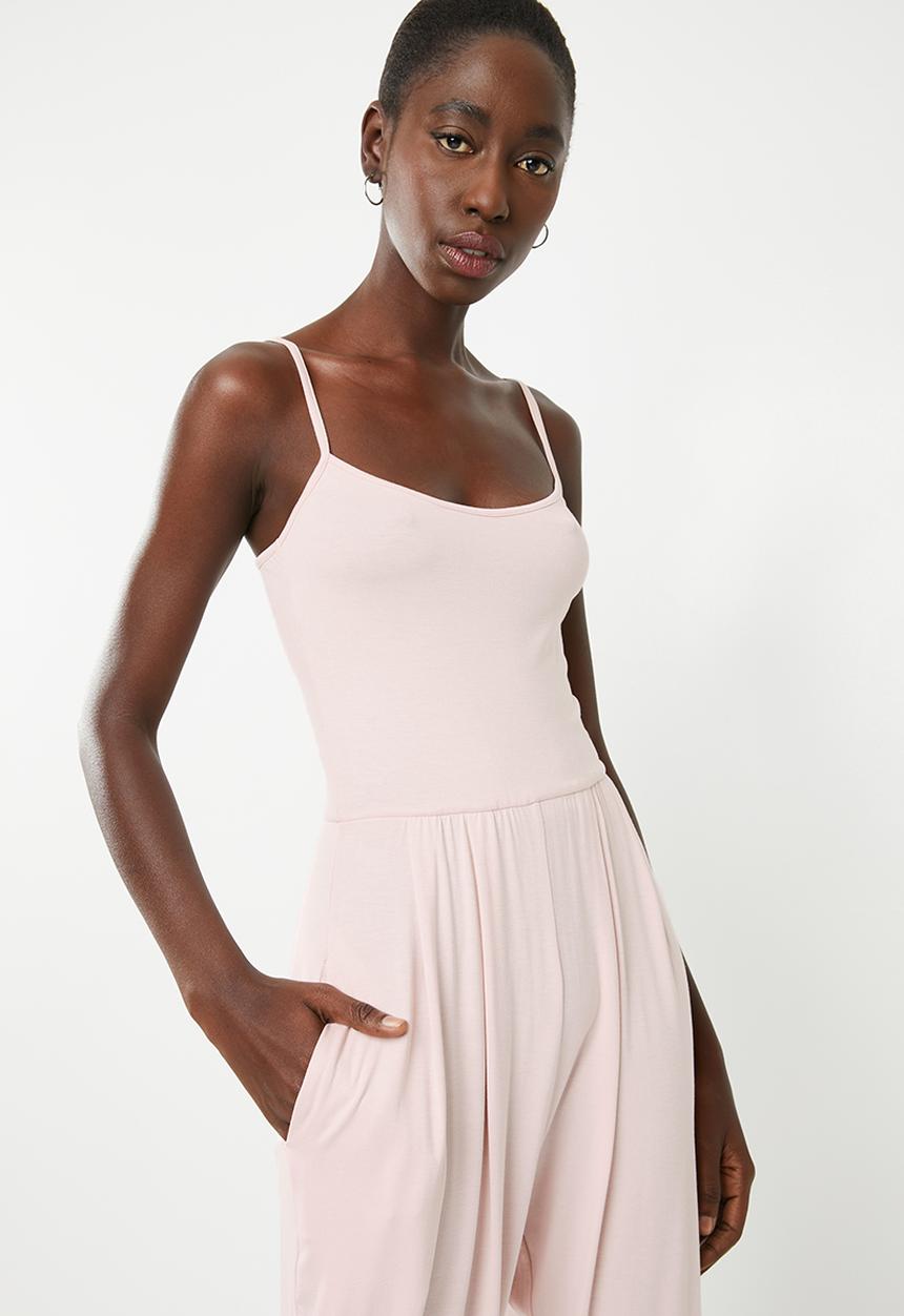 Superbalist - Strappy yoga jumpsuit with pockets at the hip - pink