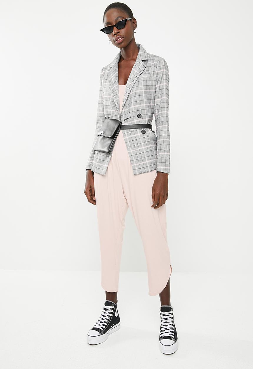 Superbalist - Strappy yoga jumpsuit with pockets at the hip - pink