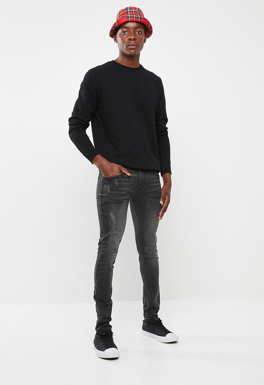 Superbalist - Skinny jeans with released hem - black