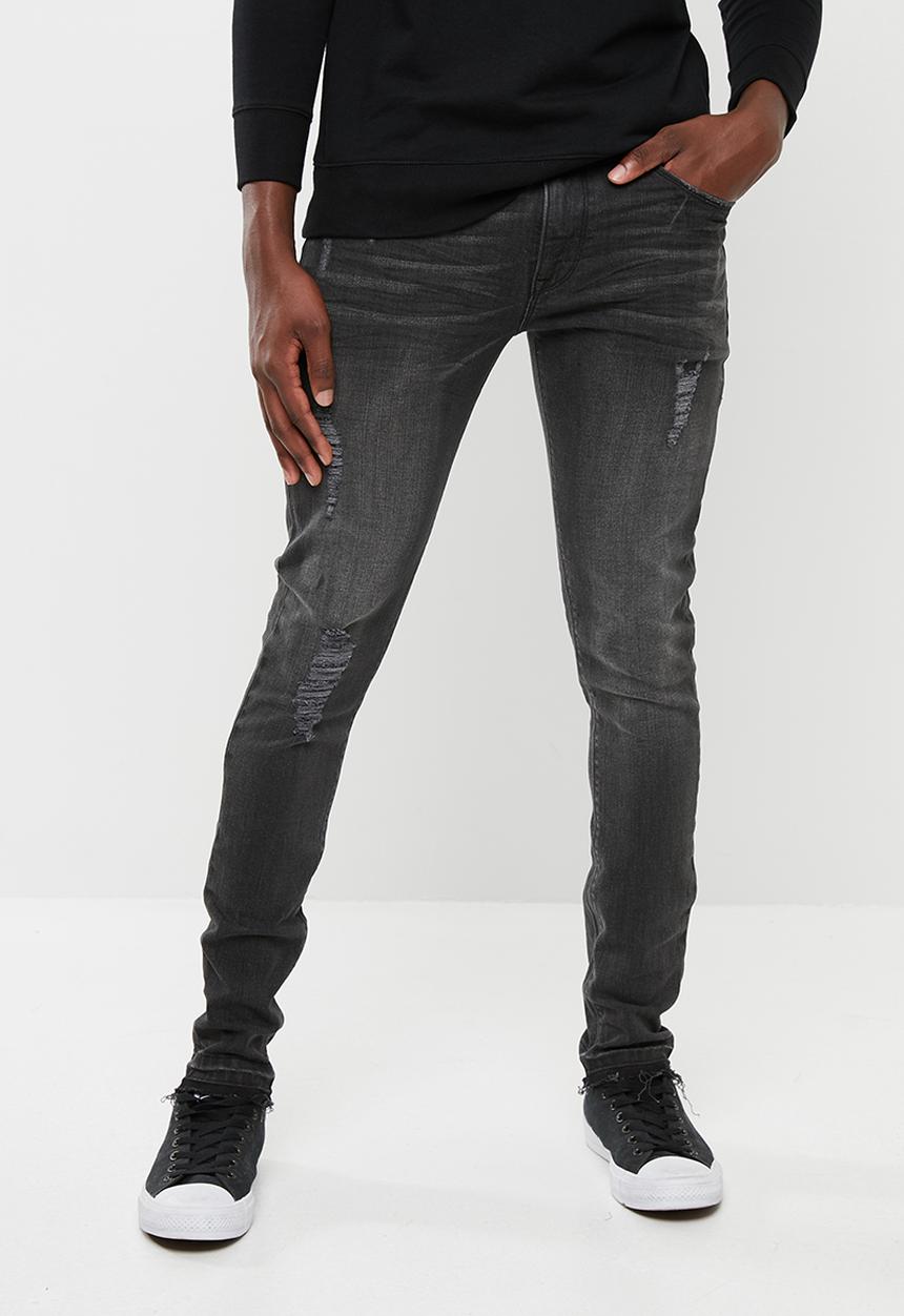 Superbalist - Skinny jeans with released hem - black