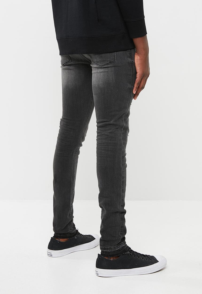 Superbalist - Skinny jeans with released hem - black