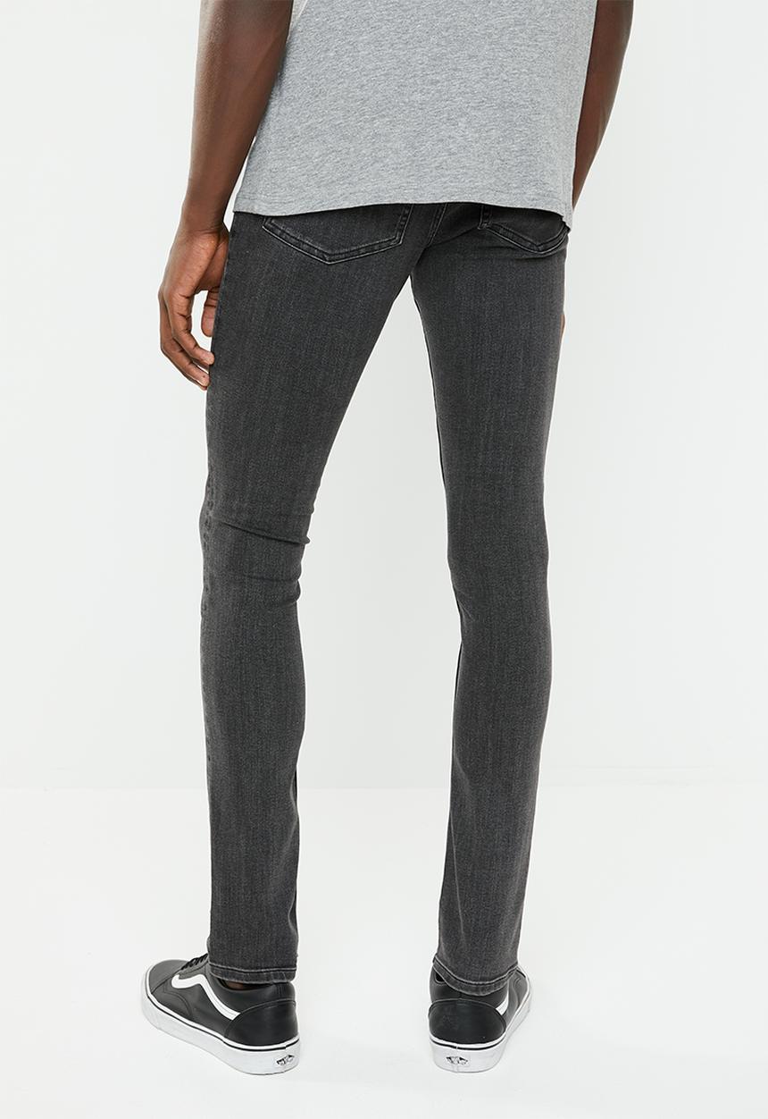 Cheap Monday - Tight fit washed jeans - black