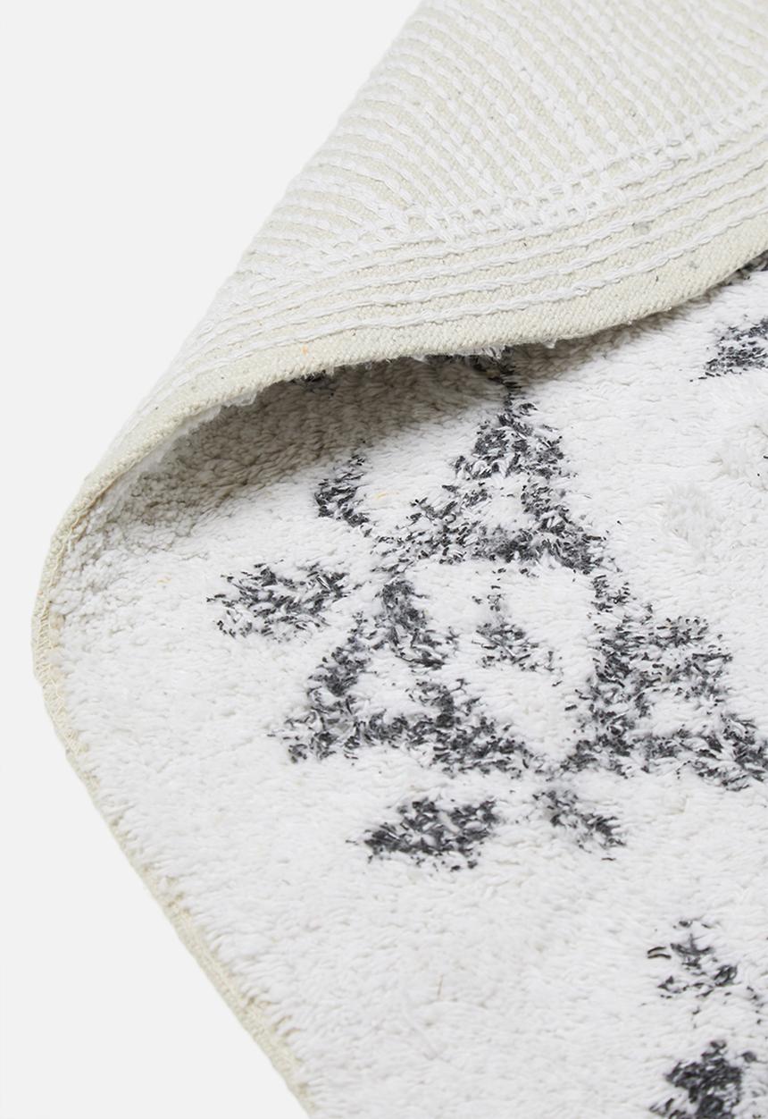 Sixth Floor - Sonja round tufted rug - white & black
