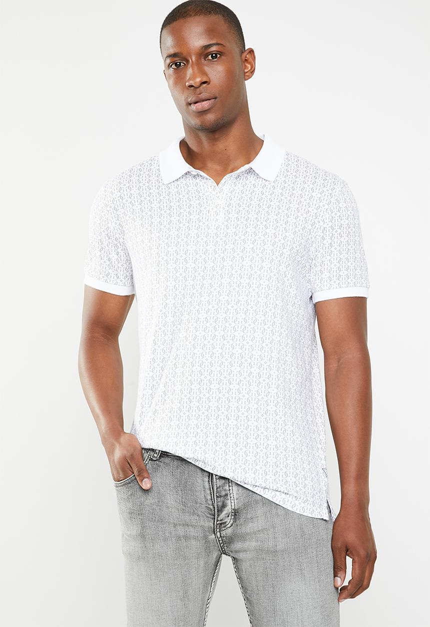 GUESS - Short sleeve quatro all over print golfer - white