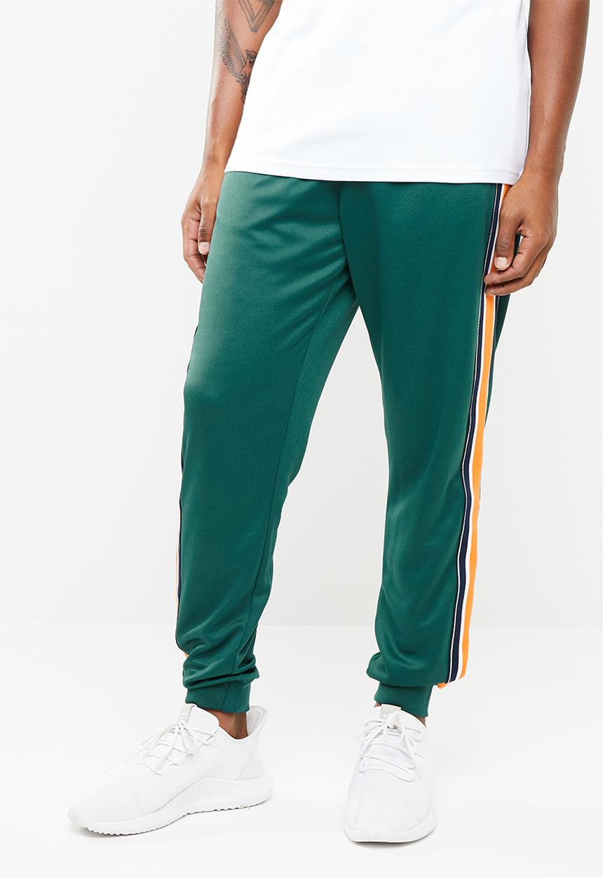 Cotton On - Slim ribbed tape tricot track jogger - green