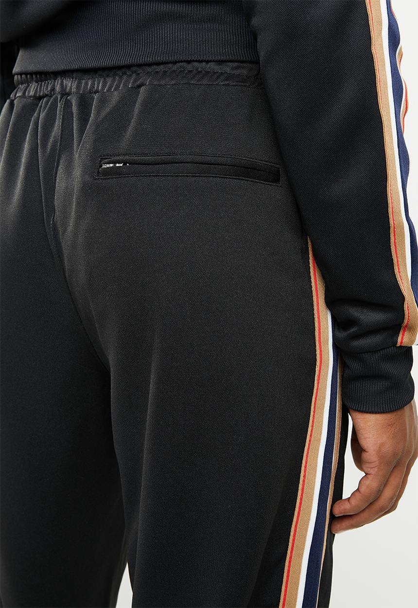 Cotton On - Slim ribbed tape tricot track jogger - black