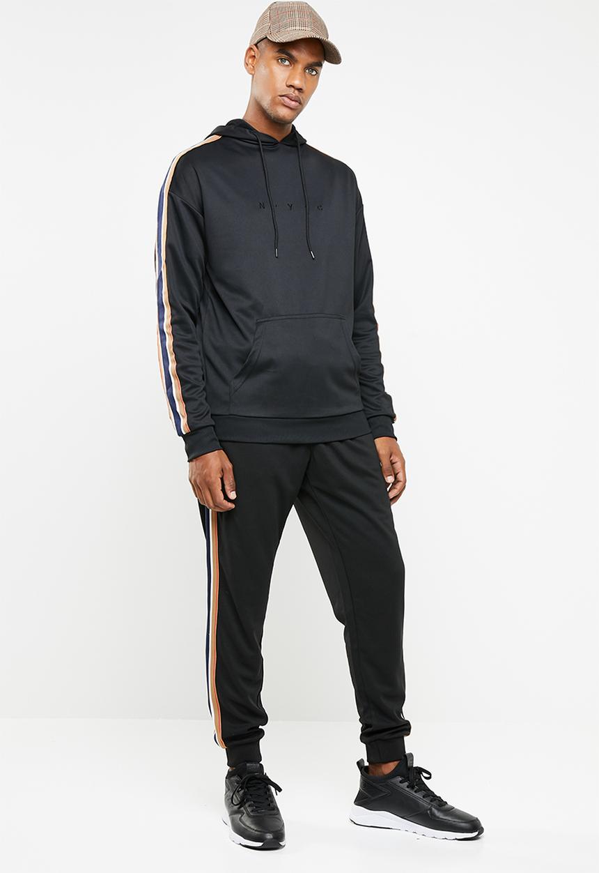 Cotton On - Slim ribbed tape tricot track jogger - black