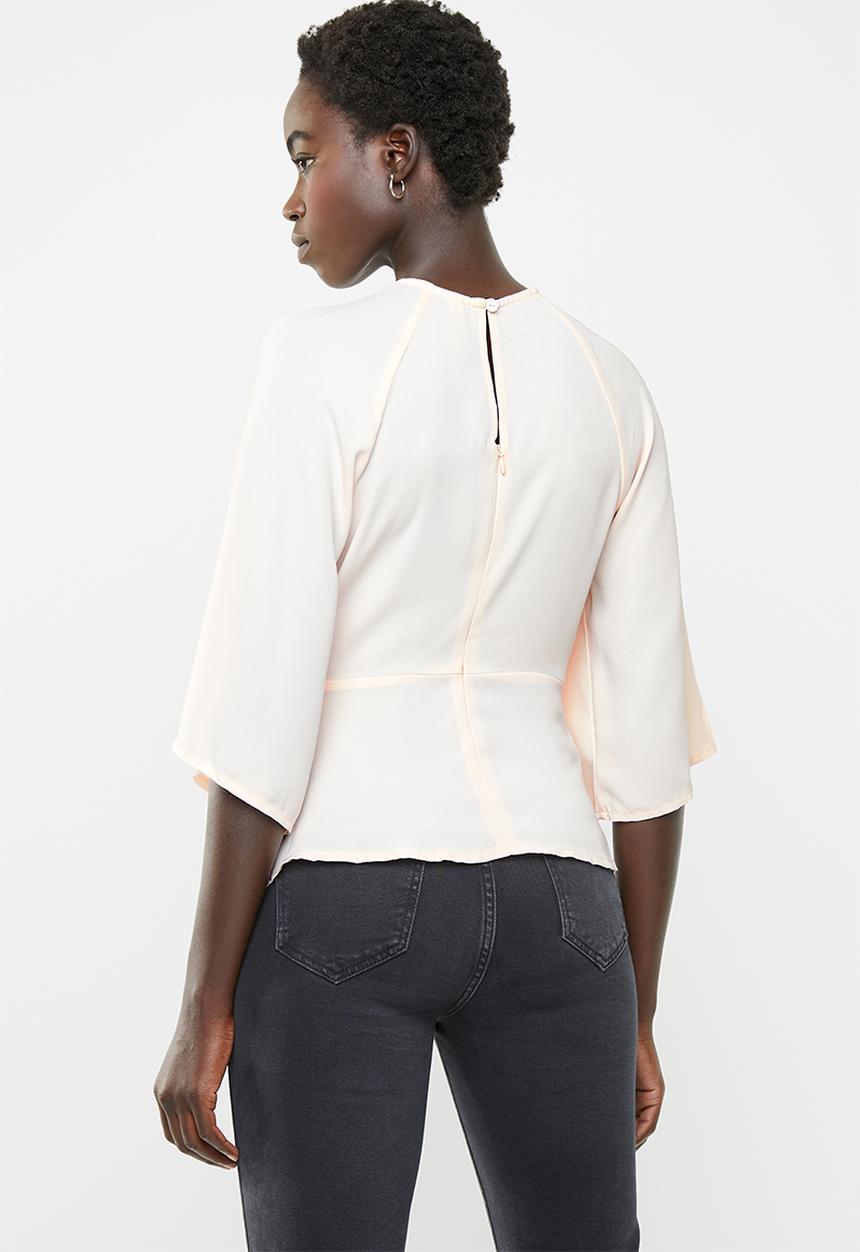 Revenge - Tie front blouse with open back - pink