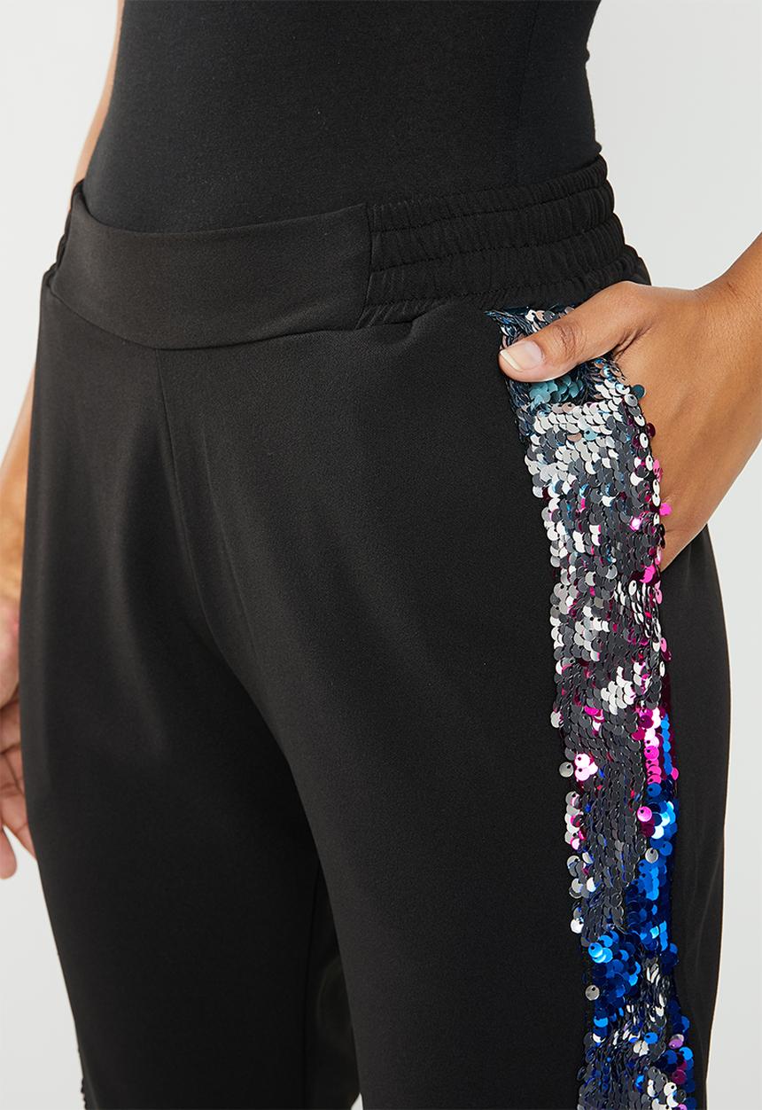RUFF TUNG - Sequin slouch trousers - black