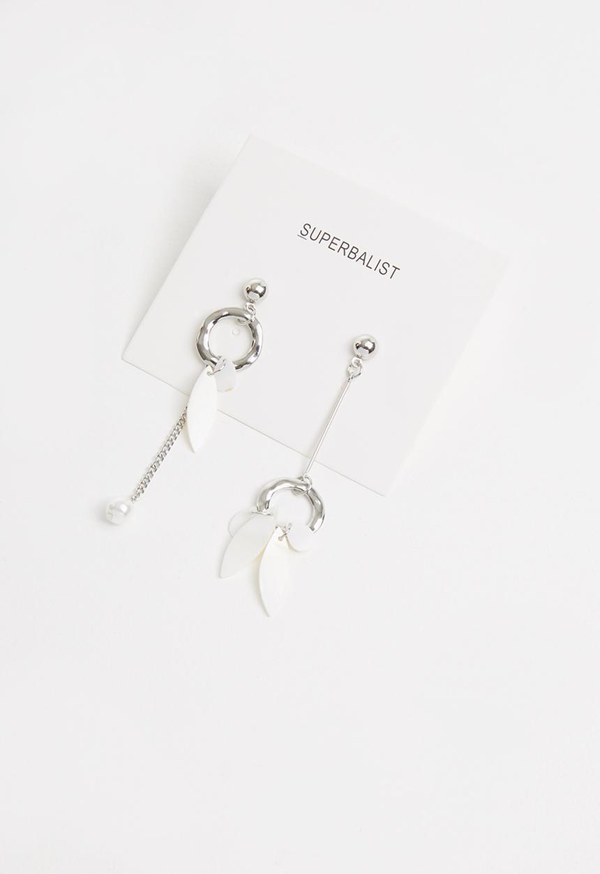 Superbalist - Paige mismatched earrings - silver & white