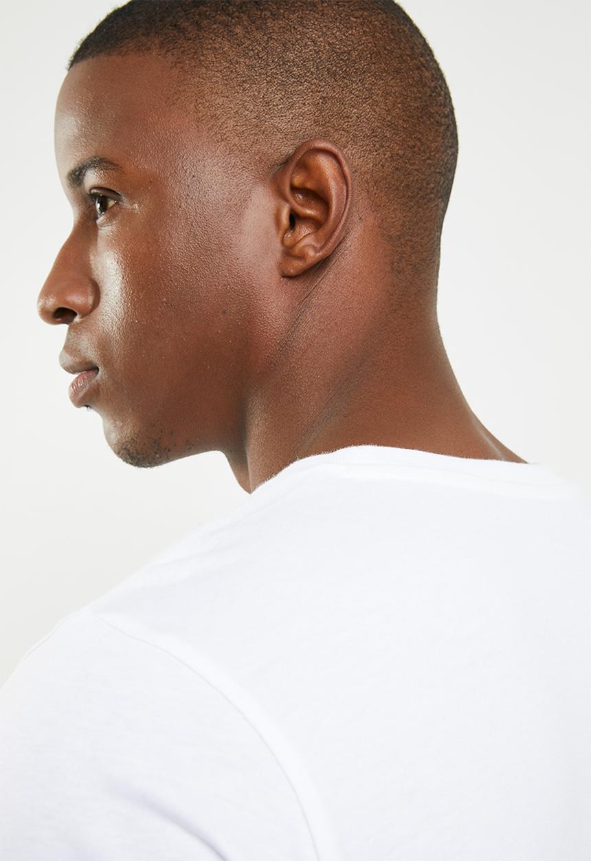 New Balance  - Essentials stacked logo  tee - white