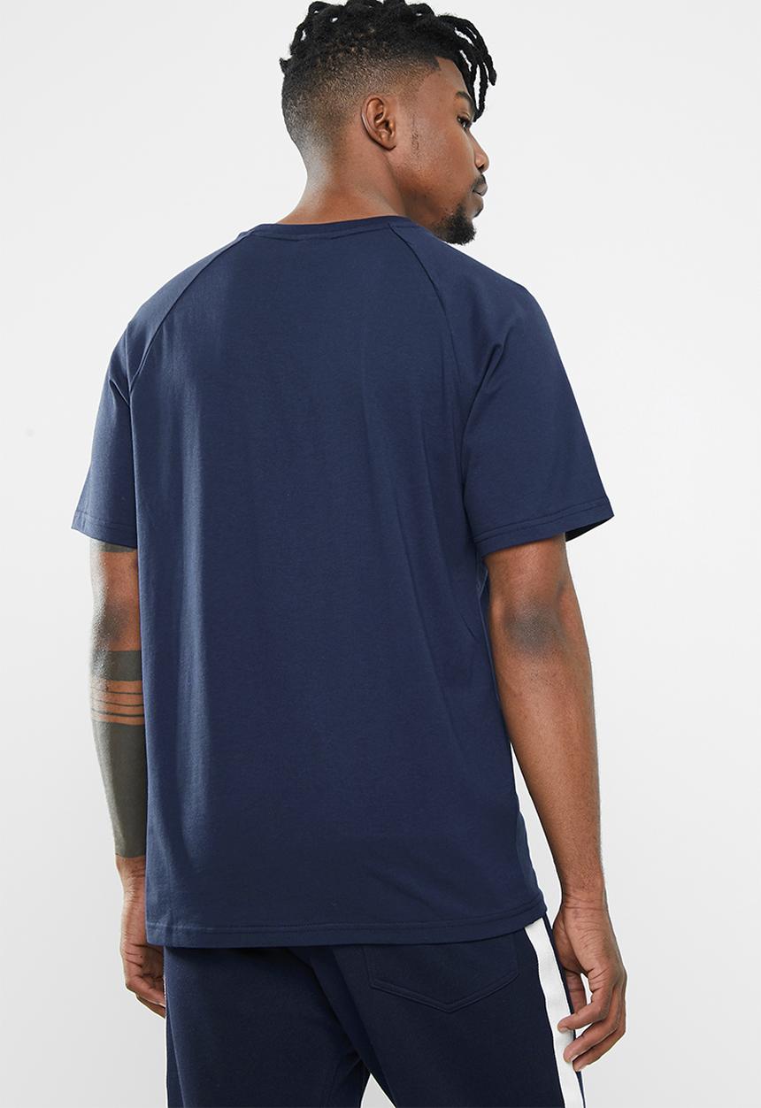 New Balance  - NB athletics raglan tee- navy & purple