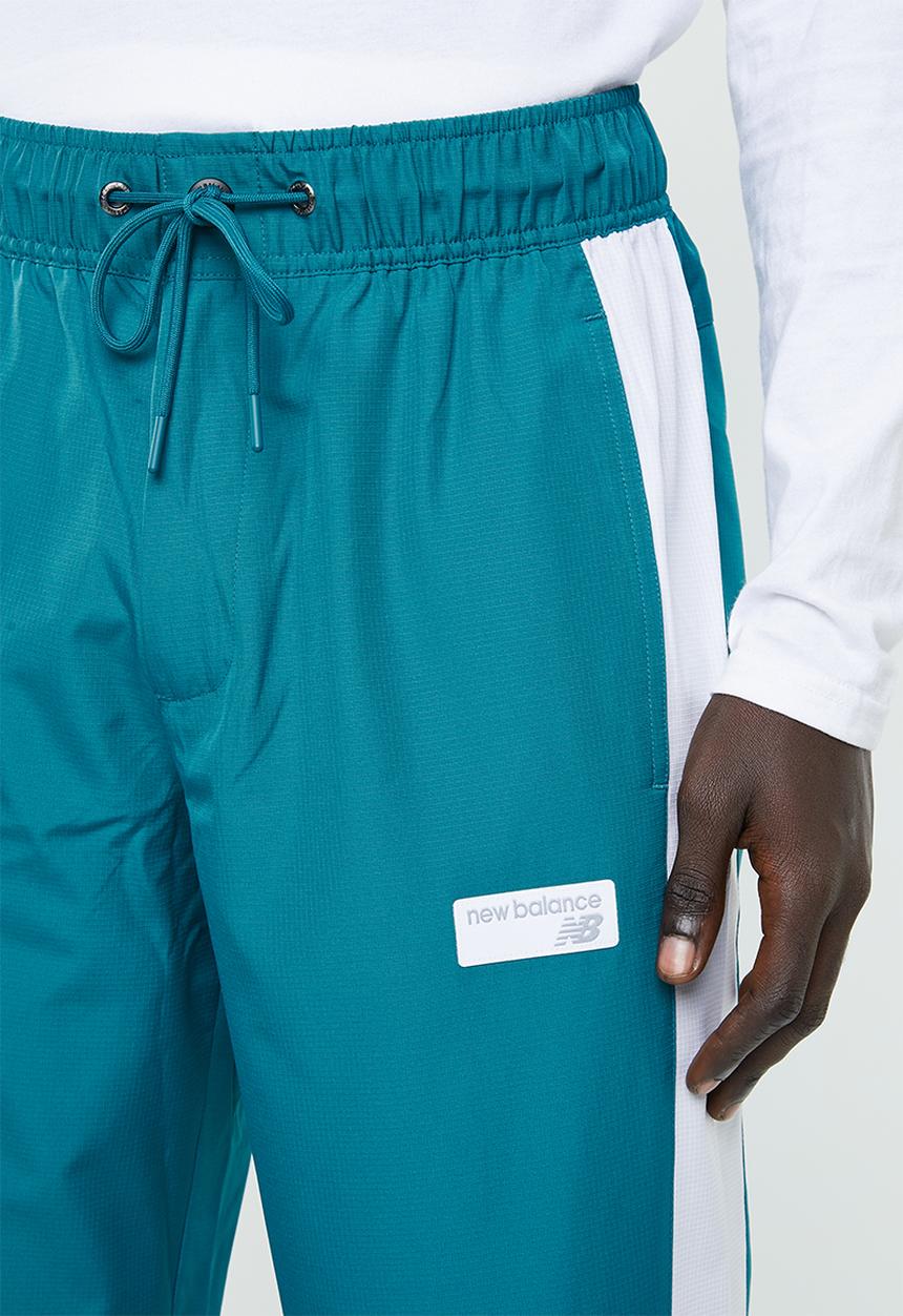 New Balance  - NB athletics windbreaker pant - green & white