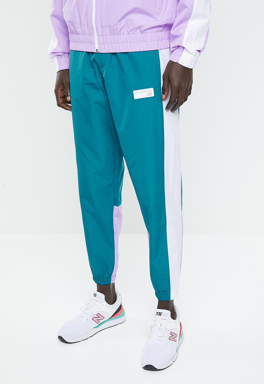 New Balance  - NB athletics windbreaker pant - green & white