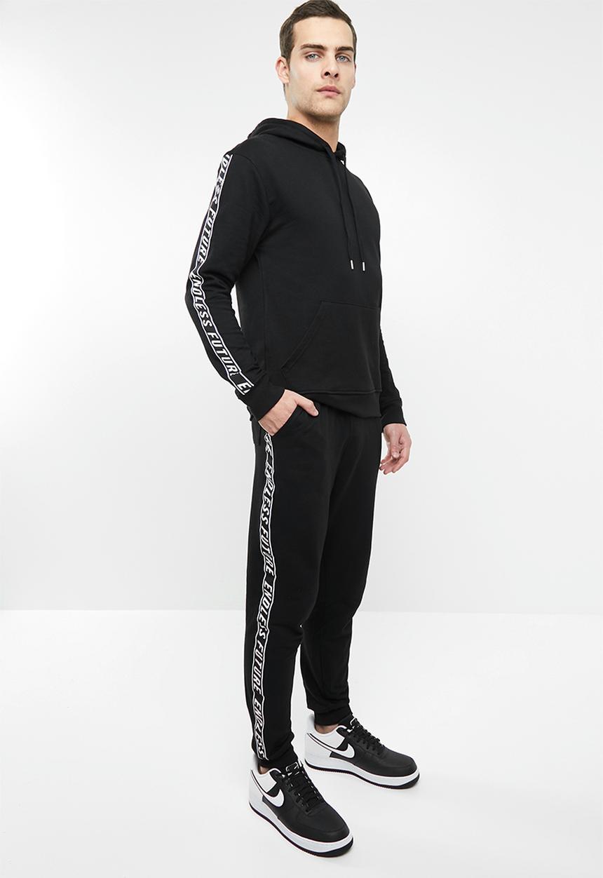 Superbalist - Slim fit printed tape sweat pant - black