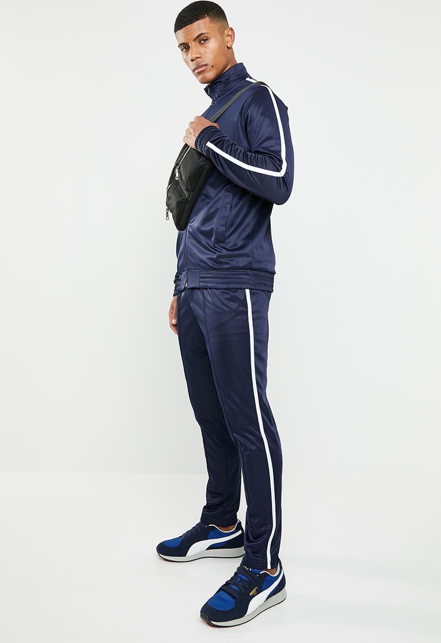Superbalist - Tapered hemmed side stripe pintuck seam tricot pant - navy
