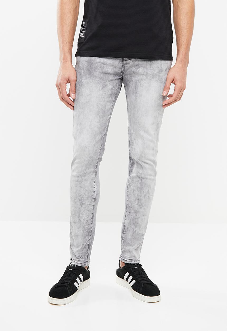 S.P.C.C - Sabre jeans in heavy bleach wash - grey