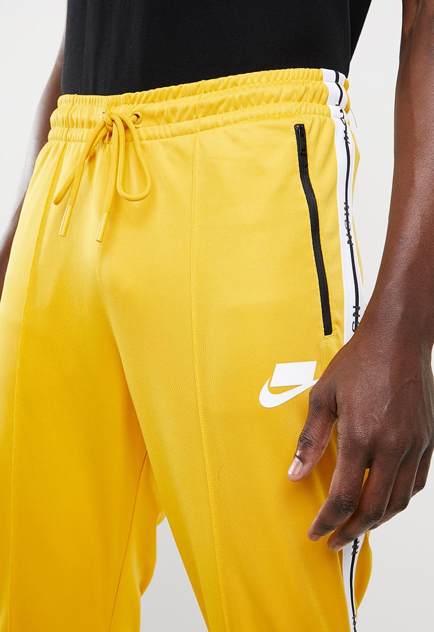 Nike - M nsw nsp track pant - yellow 