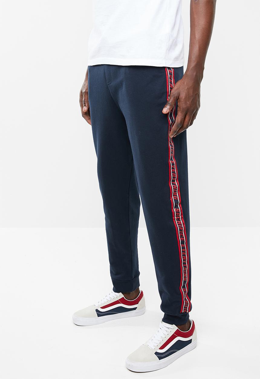 Superbalist - Slim fit printed tape sweatpant - navy & red 
