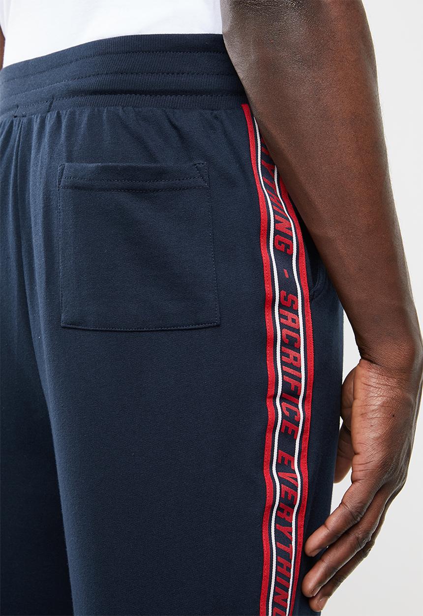 Superbalist - Slim fit printed tape sweatpant - navy & red 