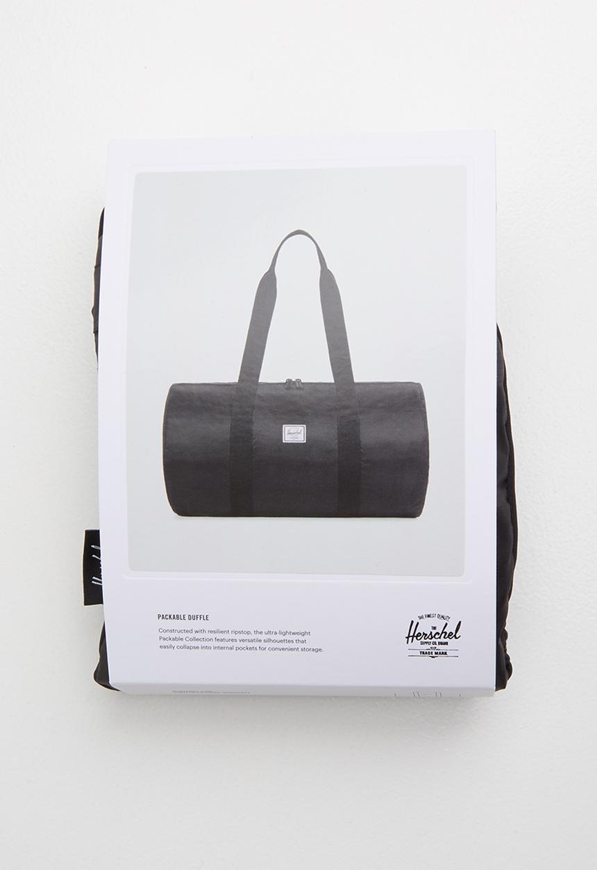 HERSCHEL - Packable duffle bag - black