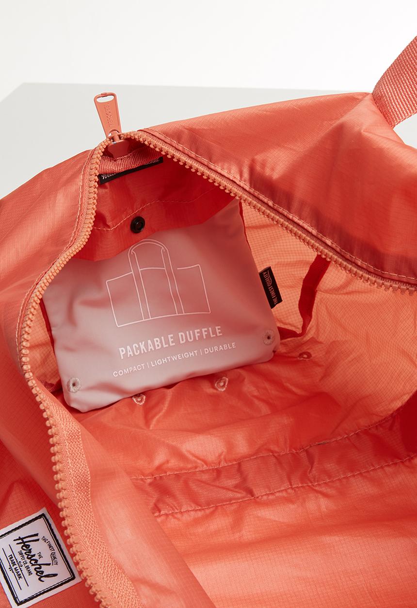 HERSCHEL - Packable duffle bag - peach