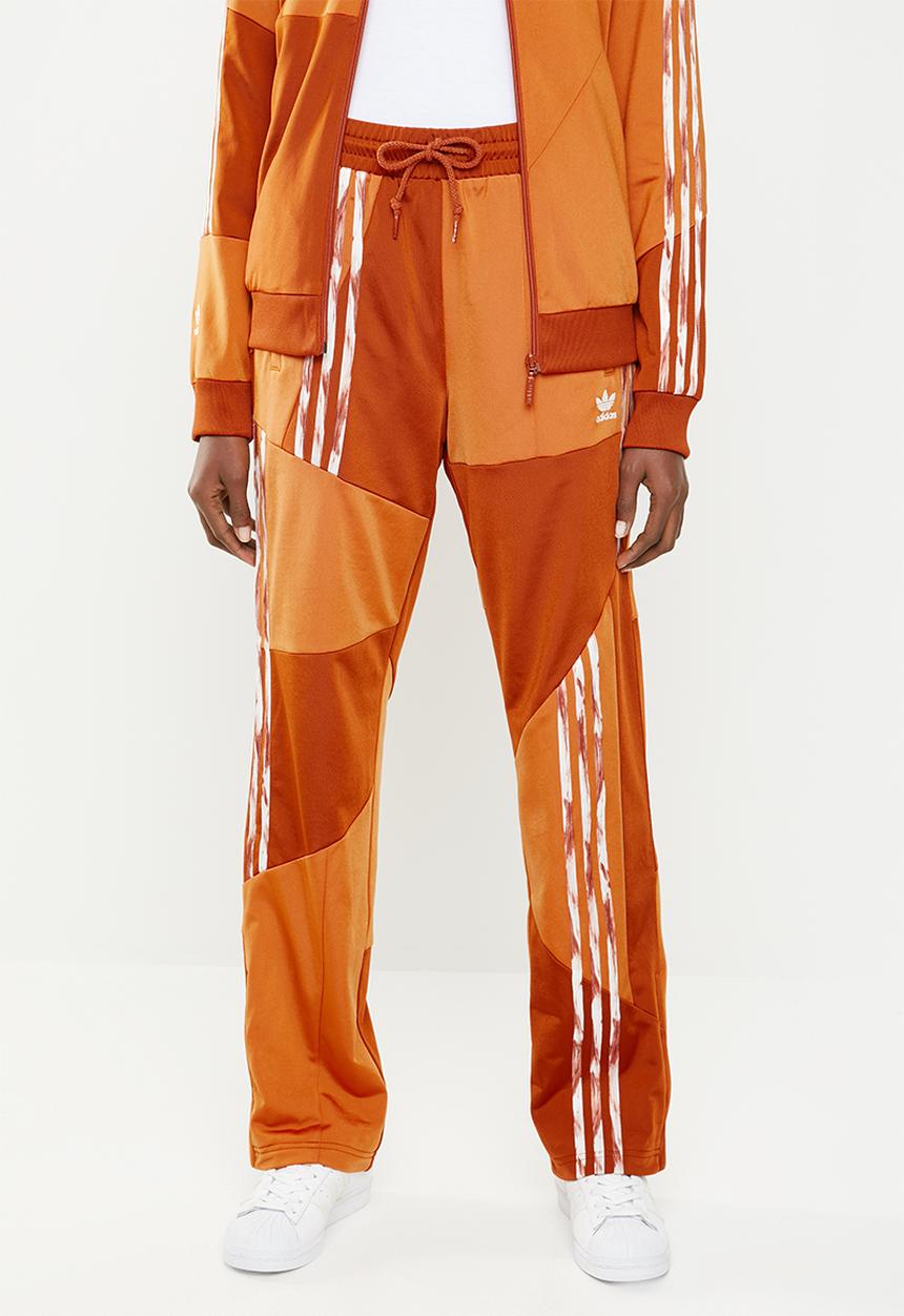adidas Originals - Danielle cathari x adidas originals fire bird tracksuit pants - orange