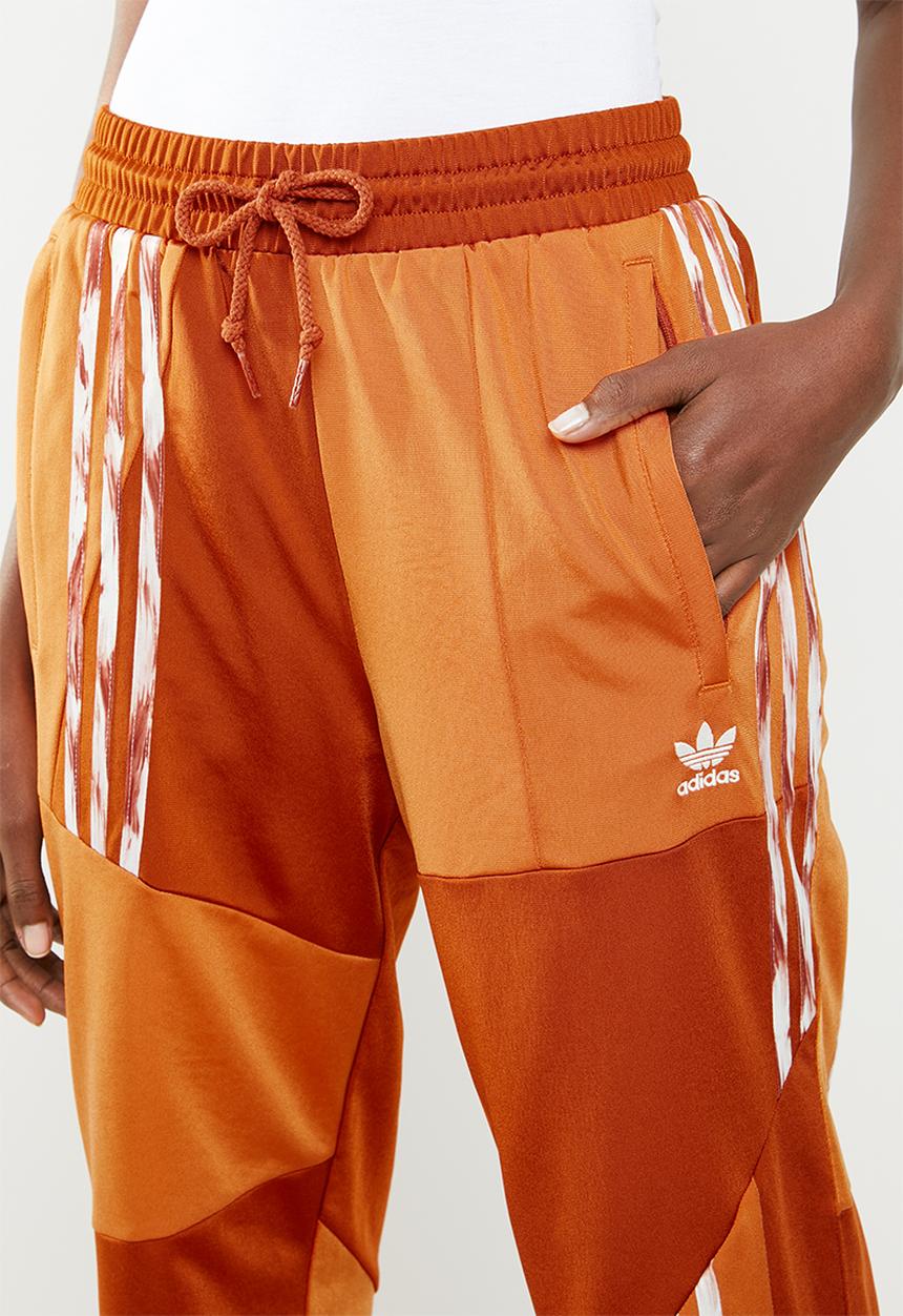 adidas Originals - Danielle cathari x adidas originals fire bird tracksuit pants - orange