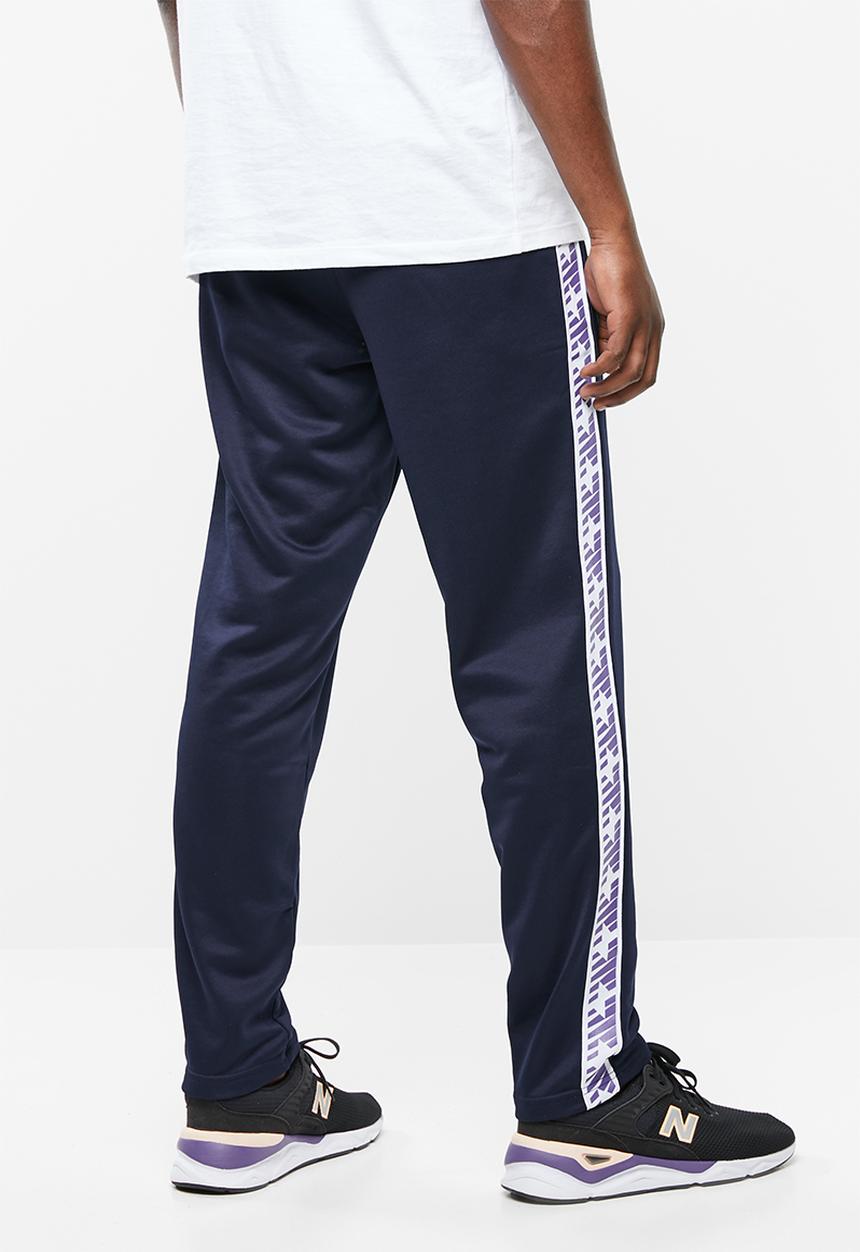 New Balance  - N pack track pant - navy