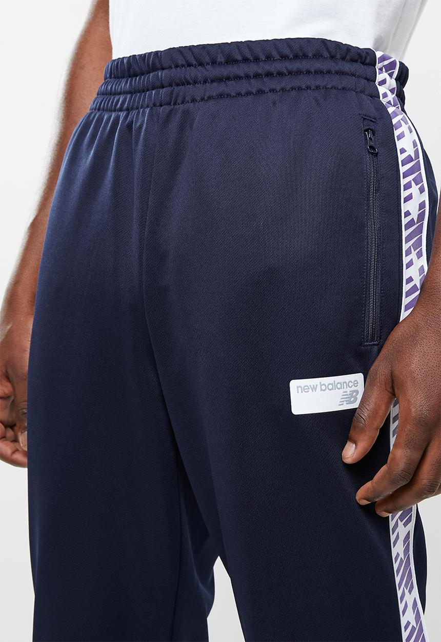 New Balance  - N pack track pant - navy
