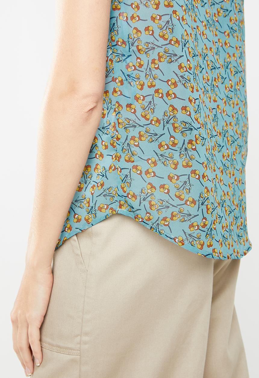 Revenge - Floral sleeveless top with front cutout - blue
